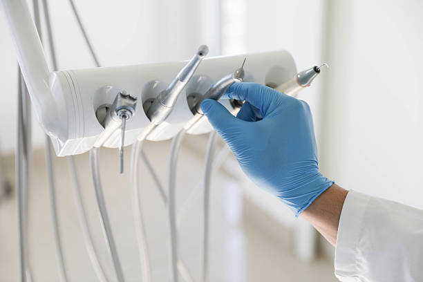 Professional Tooth Extraction technician working in Rancho Santa Fe, CA